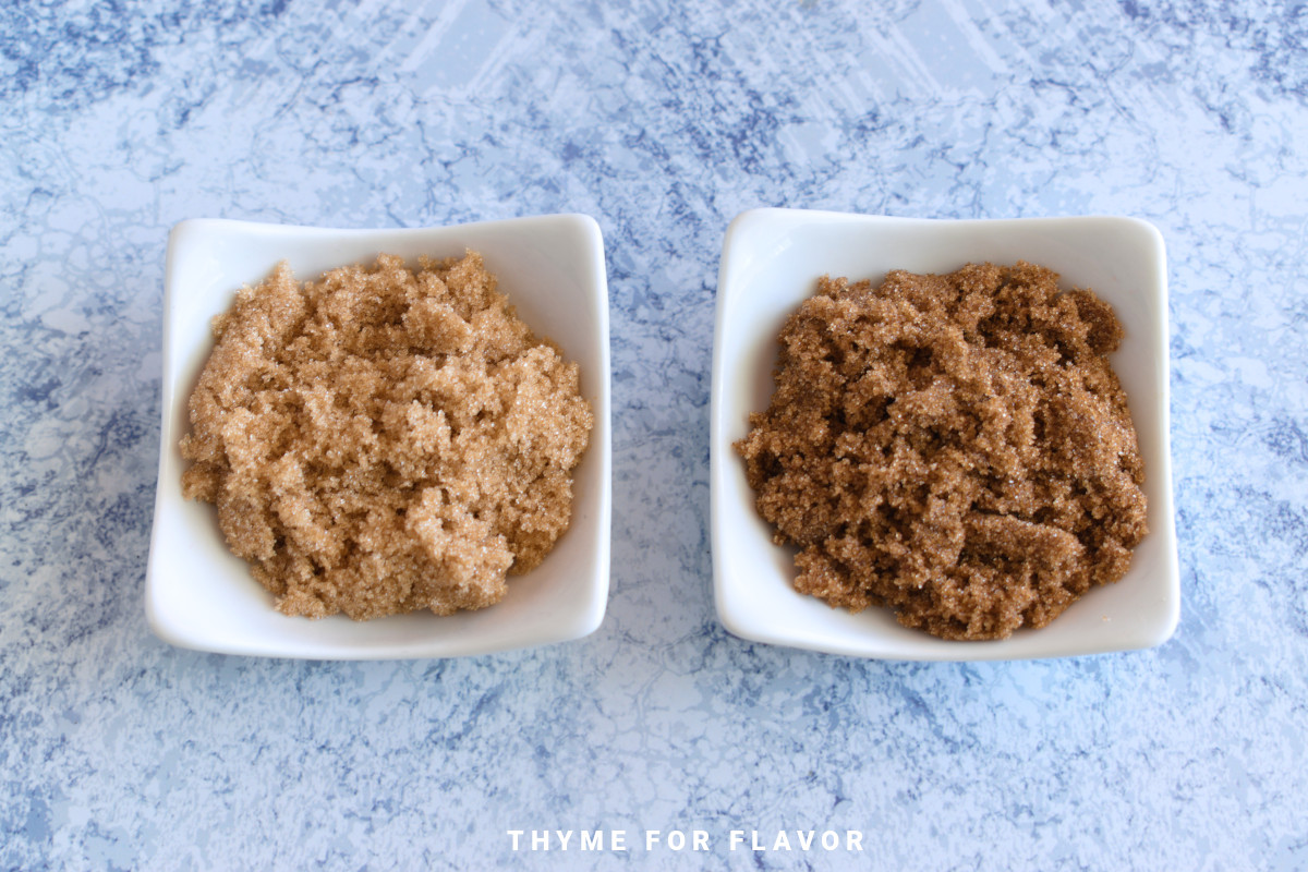 Light brown sugar and dark brown sugar on two separate white plates.