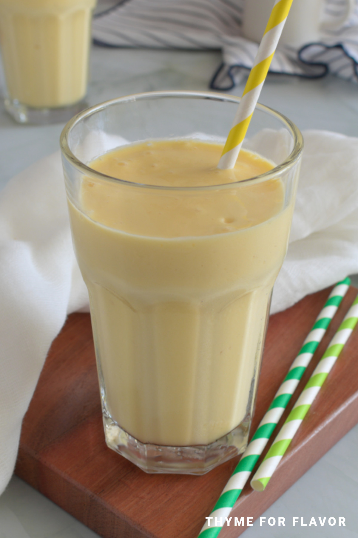 Mango milkshake in a glass.