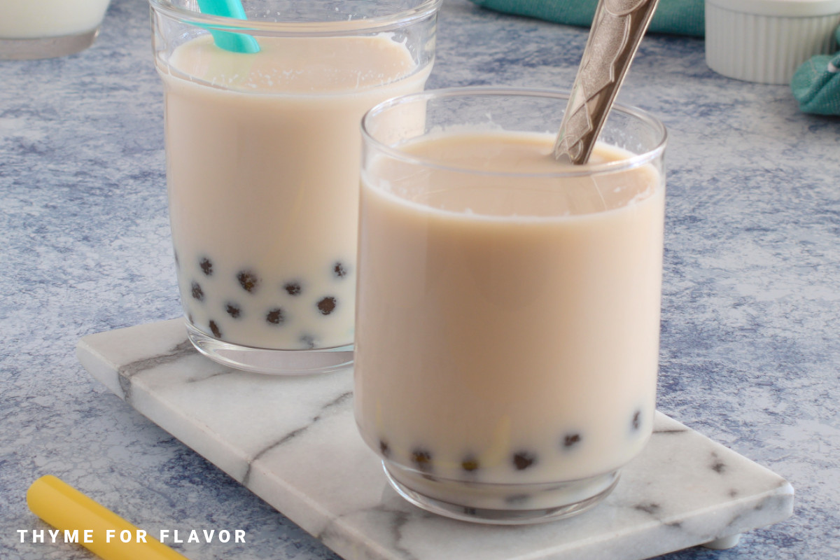 Caramel milk tea with tapioca pearls in glasses.