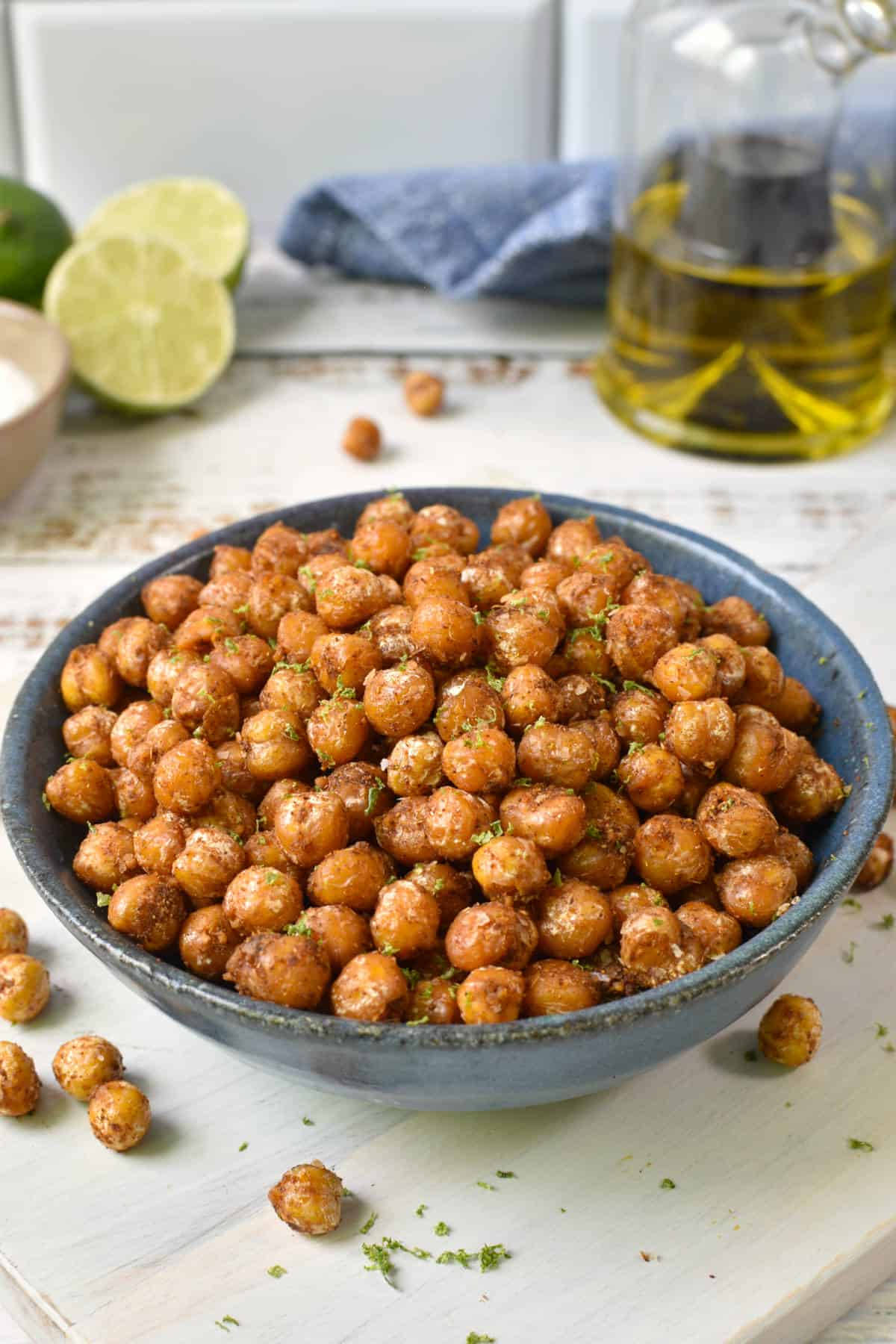 Sauteed chickpeas in a blue bowl.