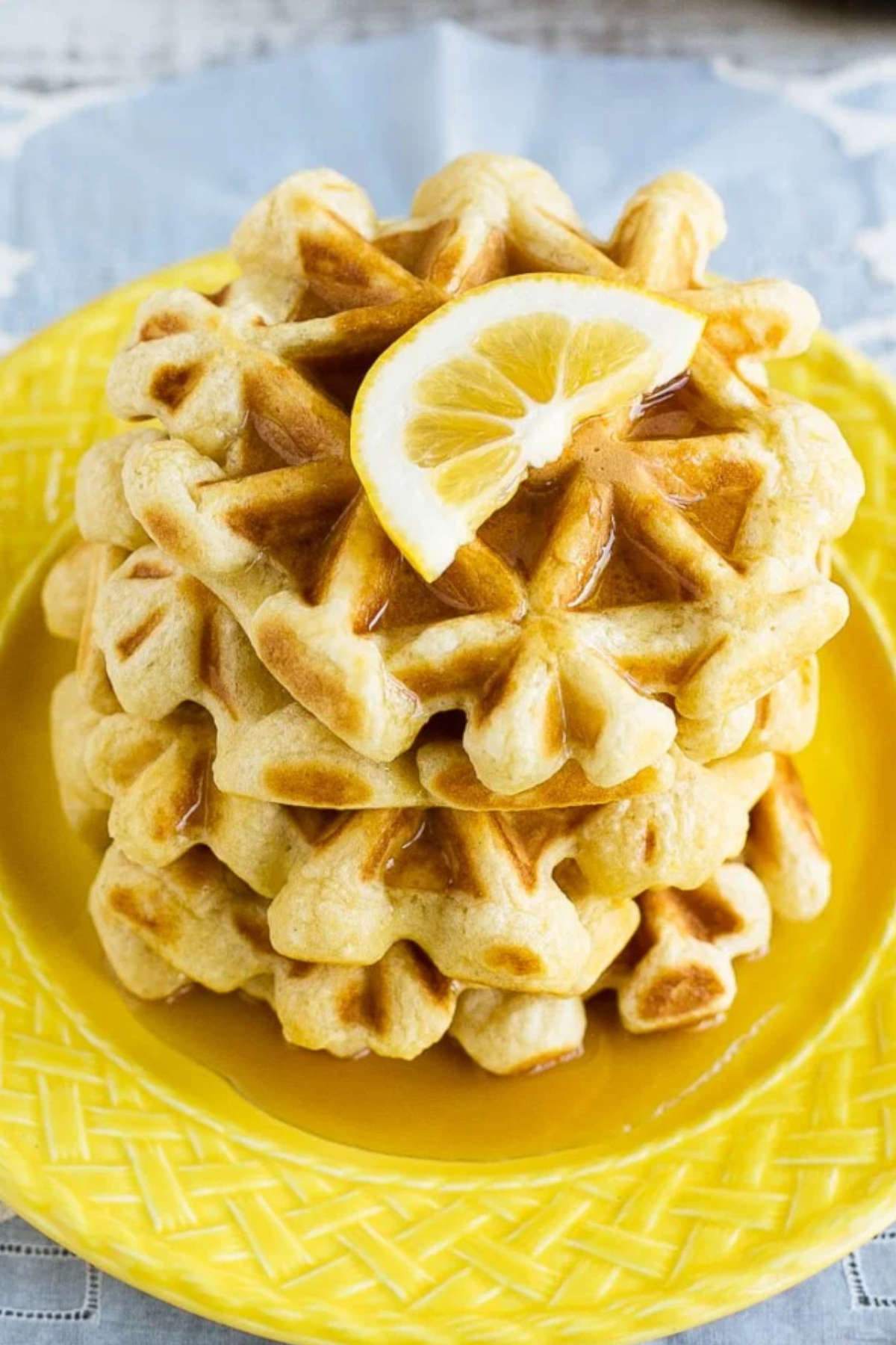 Close up image of lemon and sour cream waffles.